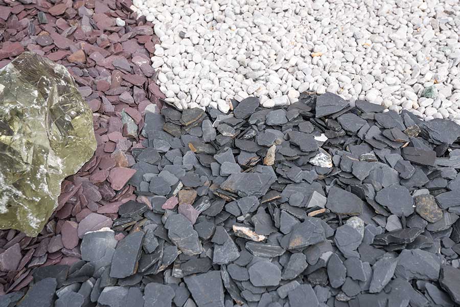Purple and blue slate chippings with small white gravel